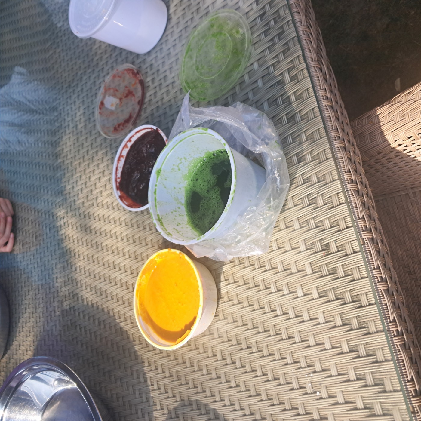 Natural Holi colour pastes in yellow, green, and red