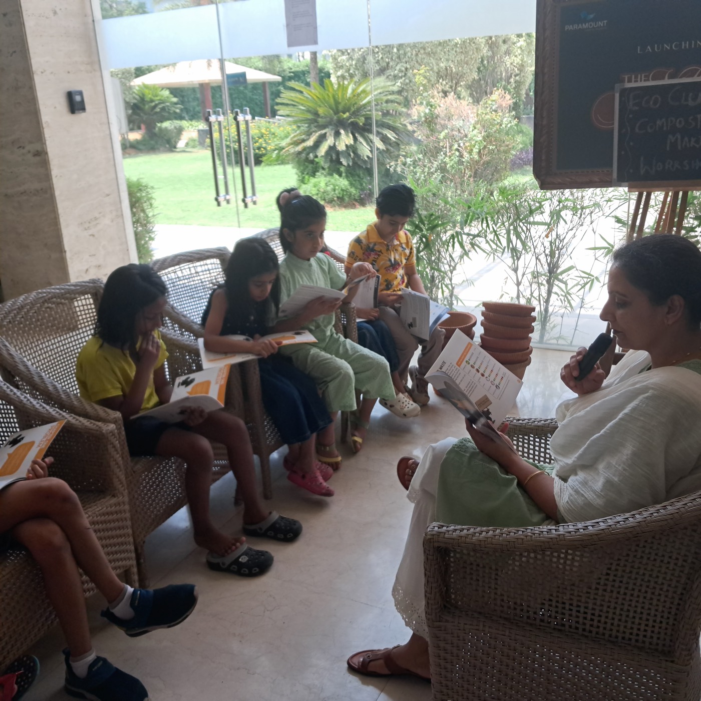 Workshop participants examining compost materials