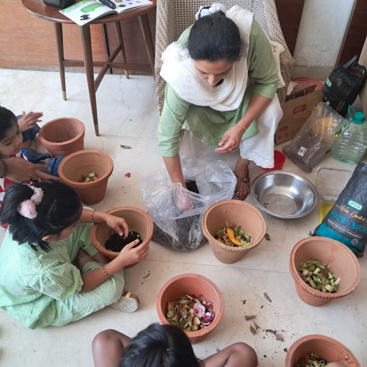 Organic waste management materials and pots at the workshop